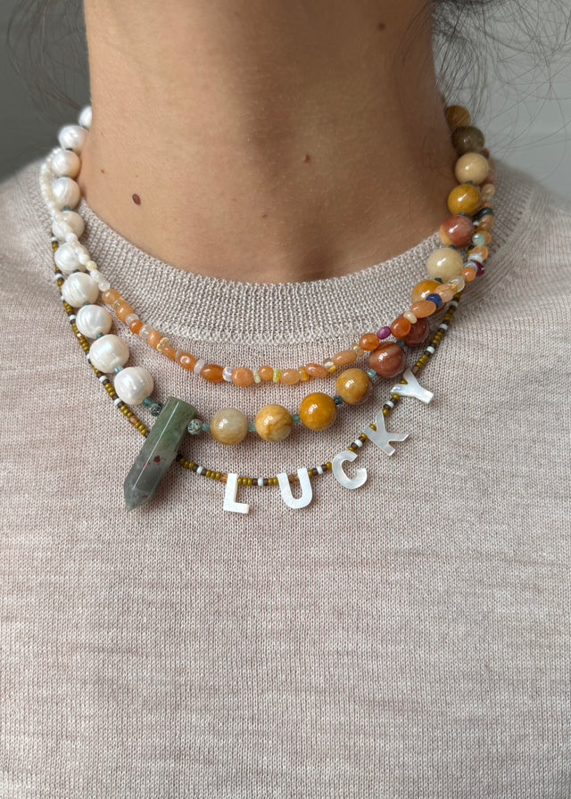 HALF HALF CRYSTAL NECKLACE